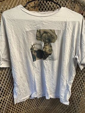 Divided White Graphic Tee with Subtle Print